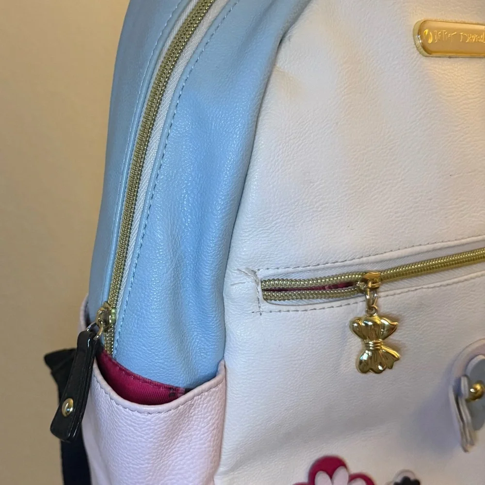 Betsey Johnson Backpack with Floral Design in Blue and Pink